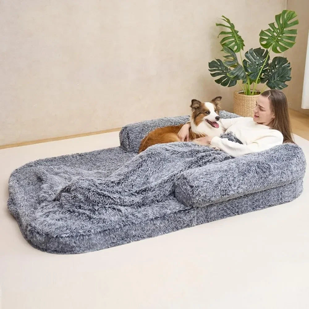 Human Sized Doggie Mattress with a lady laying on it with a corgie